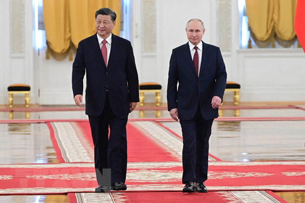 Chủ tịch Trung Quốc Tập Cận Bình (trái) và Tổng thống Nga Vladimir Putin tại Điện Kremlin ở Moskva tối 21/3