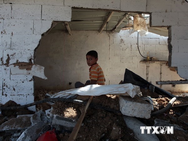 Nhà cửa bị tàn phá sau một trận không kích của Israel tại Dải Gaza. Ảnh minh họa. (Nguồn: THX/TTXVN)