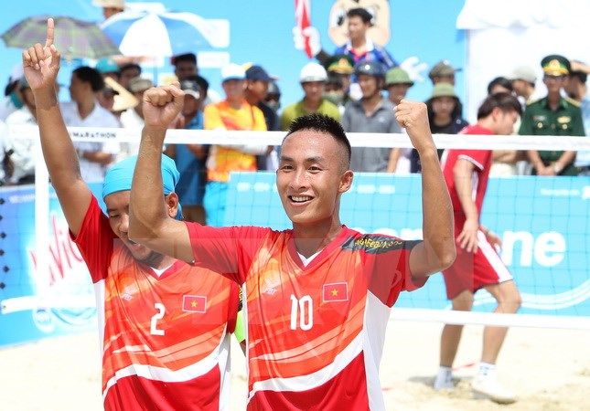 Niềm vui của các vận động viên đội Việt Nam sau khi ghi điểm. (Ảnh: Quốc Khánh/TTXVN)