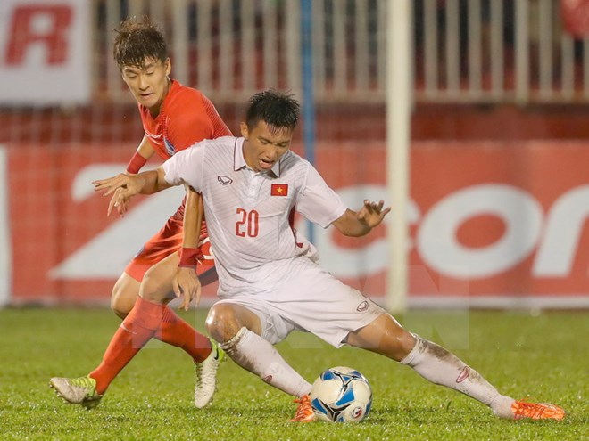 Việt Nam và Hàn Quốc cùng giành vé dự vòng chung kết U23 châu Á. (Ảnh: Quang Nhựt/TTXVN)