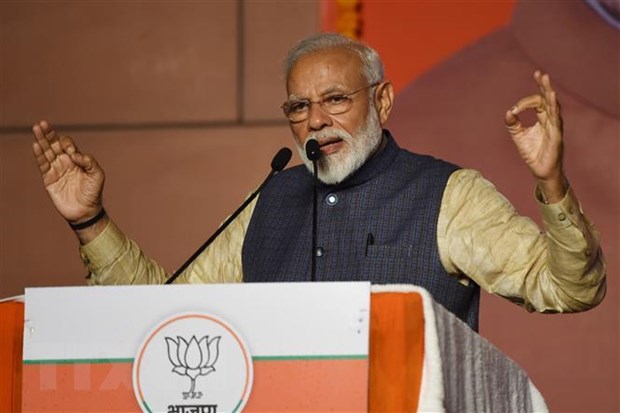 Thủ tướng Ấn Độ Narendra Modi (trái) phát biểu tại trụ sở đảng BJP ở New Delhi. (Ảnh: AFP/TTXVN)