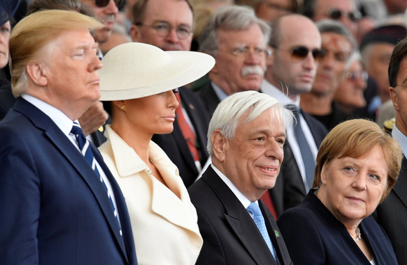 Tổng thống Mỹ Donald Trump, Đệ nhất phu nhân Melania Trump, Tổng thống Hi Lạp Prokopis Pavlopoulos và Thủ tướng Đức Angela Merkel (từ trái qua) dự lễ kỷ niệm 75 năm ngày diễn ra sự kiện D-Day ở Portsmouth, Anh ngày 5-6 - Ảnh: REUTERS