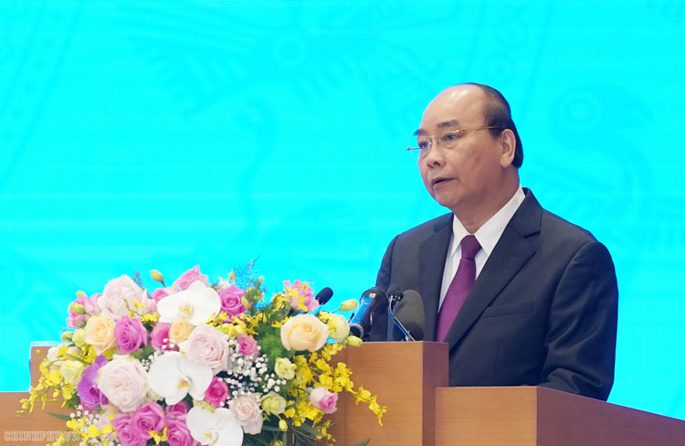 Thủ tướng Chính phủ đọc diễn văn khai mạc phiên họp trực tuyến.Ảnh: Chinhphu.vn