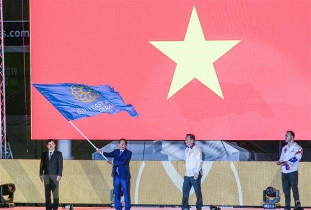 Bộ trưởng Văn hóa, Thể thao và Du lịch Việt Nam Nguyễn Ngọc Thiện nhận cờ đăng cai SEA Games 31