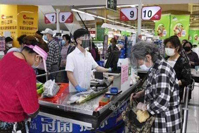 Người dân mua sắm tại một siêu thị ở Vũ hán, tỉnh Hồ Bắc, Trung Quốc, ngày 21/5.