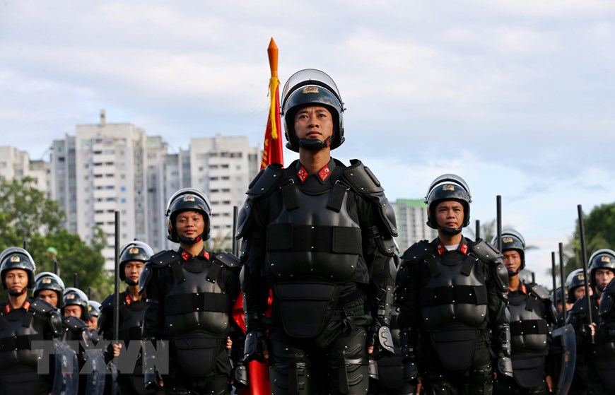 Các chiến sỹ khối Cảnh sát cơ động tham gia diễu hành tại Hà Nội lễ khai mạc. (Ảnh: Dương Giang/TTXVN)