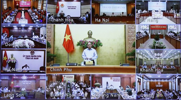 Thủ tướng Nguyễn Xuân Phúc phát biểu tại phiên họp trực tuyến toàn quốc. (Ảnh: Thống Nhất/TTXVN)