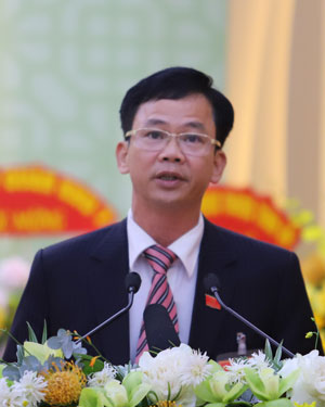 Đồng chí Nguyễn Văn Sơn - Giám đốc Sở Nông nghiệp và Phát triển nông thôn trình bày tham luận