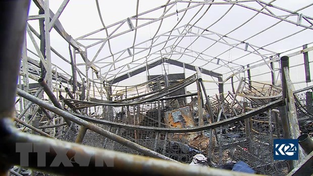 Cảnh tàn phá sau vụ tấn công bằng rocket nhằm vào một căn cứ quân sự ở sân bay Arbil, Iraq, ngày 17/2/2021