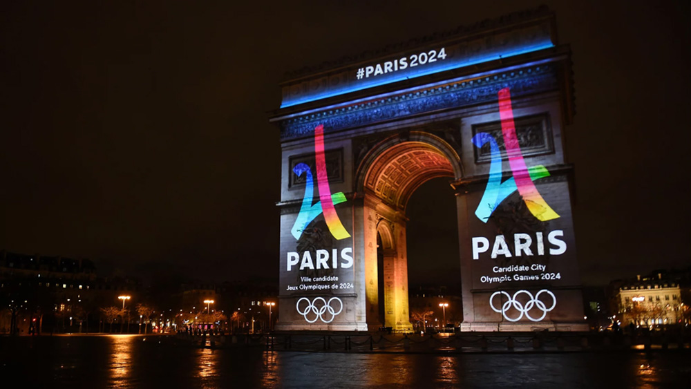 Biển quảng cáo Thế vận hội Paris 2024 trên cổng Khải hoàn môn tại Paris, Pháp