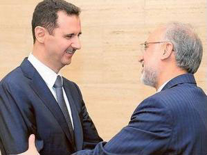 Tổng thống Syria Bashar Al Assad đón tiếp Ngoại trưởng Iran Ali Akbar Salehi. (Nguồn: AFP)