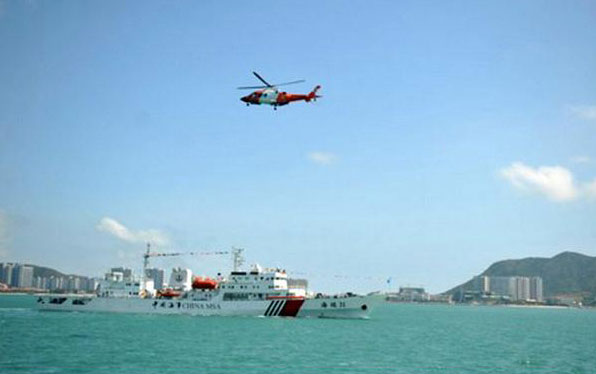 Từ ngày 4-3-2013, tàu hải tuần 31 của Trung Quốc cùng trực thăng đã đến và tuần tra ở bãi Tư Nghĩa do Trung Quốc chiếm đóng ở quần đảo Trường Sa của Việt Nam - Ảnh: Chinanews.com 