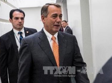 Chủ tịch Hạ viện Mỹ John Boehner rời khỏi cuộc họp của các nghị sĩ đảng Cộng hòa ở Washington, DC., ngày 12/10. (Nguồn: AFP/ TTXVN)