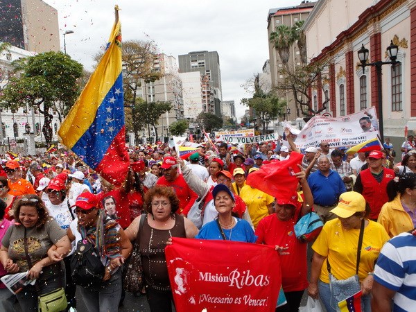 Người dân Venezuela tuần hành vì hòa bình tại thủ đô Caracas. (Nguồn: THX/TTXVN)