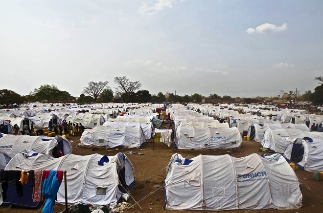 Người tị nạn Nam Sudan tại Trung tâm luân chuyển ở Adjumani, Uganda ngày 24/1. (Nguồn: AFP/TTXVN)