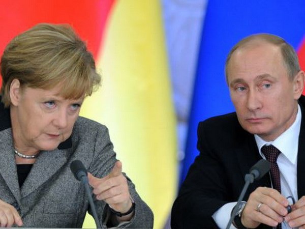 Thủ tướng Đức Angela Merkel và Tổng thống Nga Vladimir Putin ở Moskva, tháng 11/2013. (Nguồn: AFP)