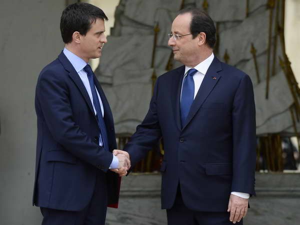 Tổng thống Pháp Francois Hollande (phải) và tân Thủ tướng Manuel Valls. (Nguồn: AFP/TTXVN)