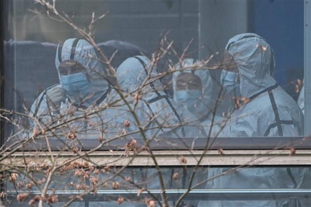 Nhóm chuyên gia WHO trong chuyến làm việc tại Trung tâm Kiểm soát và ngăn ngừa dịch bệnh tỉnh Hồ Bắc, Trung Quốc ngày 2/2